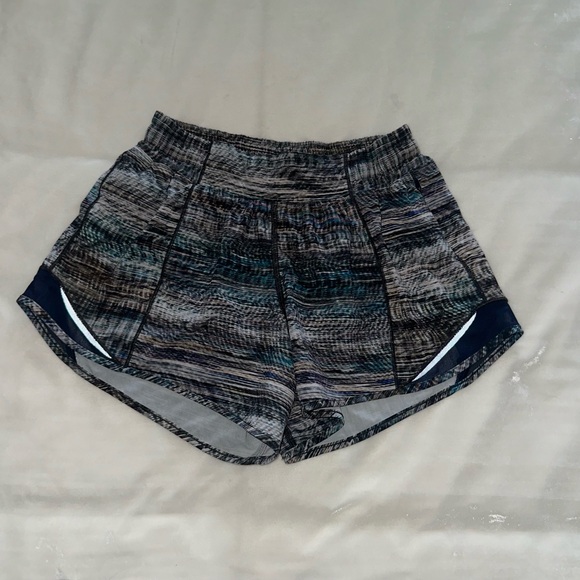LULULEMON Gray, Blue, White, and Black Shorts with Curved Hem - Picture 1 of 4